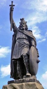 This picture shows Alfred the Great's statue at Winchester. Hamo Thornycroft's bronze statue erected in 1899. Image taken by Odejea. Via Wikimedia Commons.